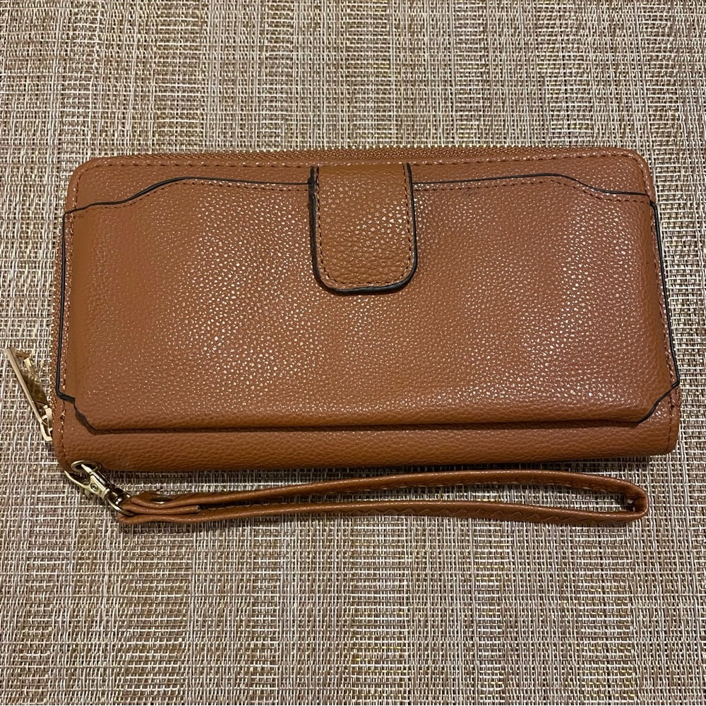 Medium brown pebbled zip around wristlet wallet